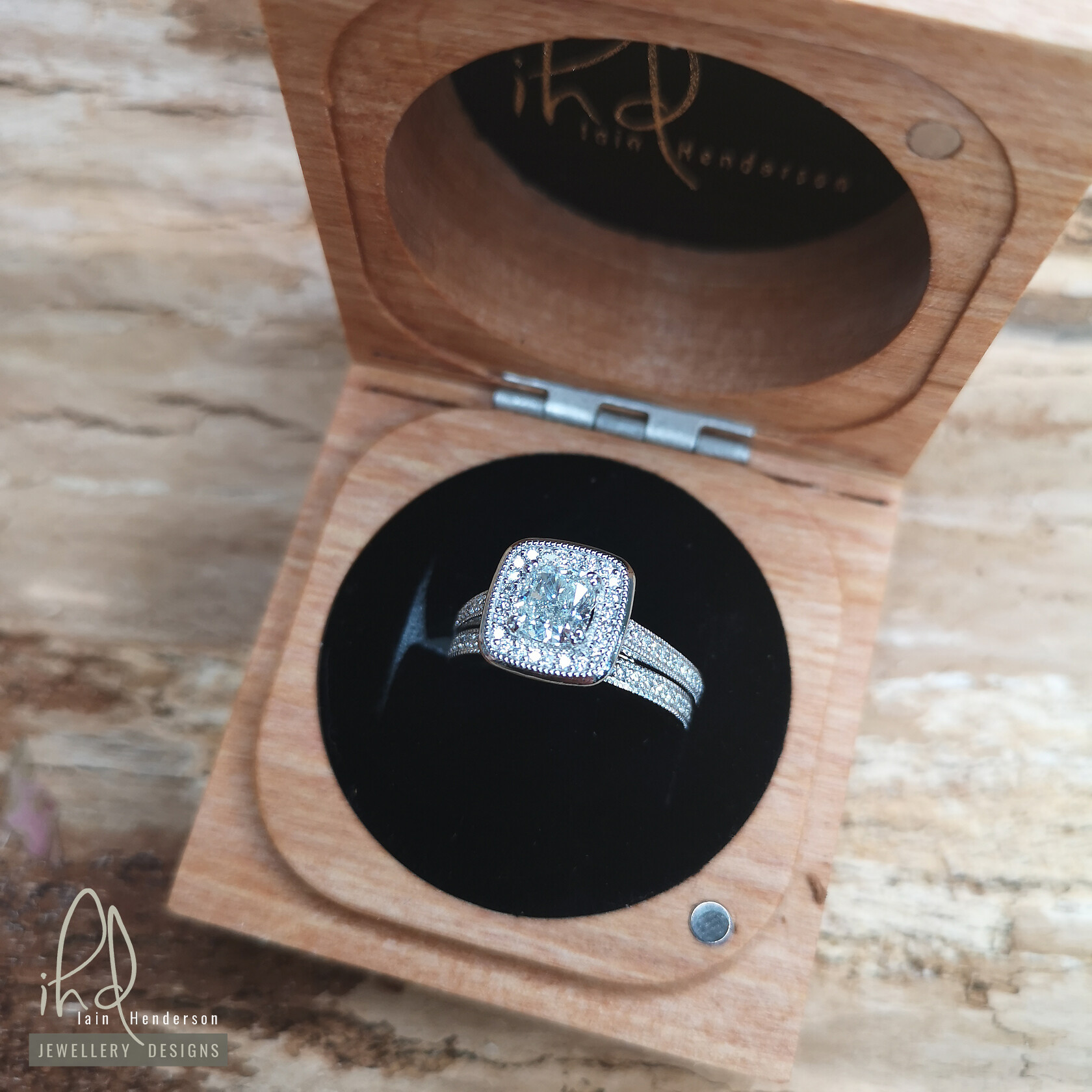 Cushion halo style engagement ring with matching wedding ring 
 dav