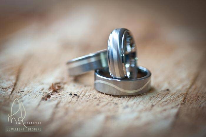 Mens wedding rings with different inlay designs
